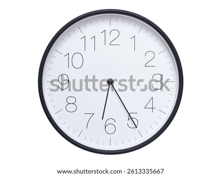Simple wall clock with black frame and white face displaying 06:25 or 18:25. Ideal for time, schedule, and punctuality themes.