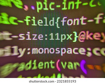 Simple website HTML code with colourful tags in browser view on dark background. Future technology creation process. Selective focus. Javascript code. HTML markup language closeup