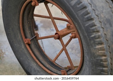 A Simple  Wheel And Tire On A Small Farm Tractor.  