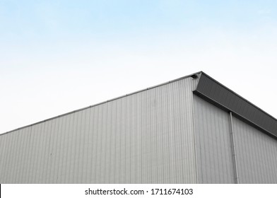 Simple White Concrete Building Corner for Sale or Loan, Basic Minimal Shape Abstract Exterior Warehouse or Construction Element Concept, Blue Sky and Cloud in Background with Copy Space