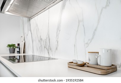 Simple White Kitchen Counter With Glass Cooktop