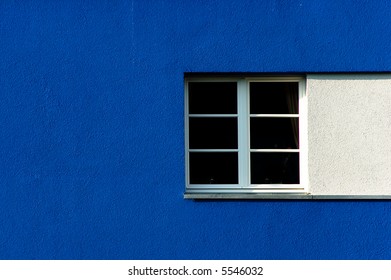 A simple window in a blue wall - Powered by Shutterstock - Get 15% off with code: PIKWIZARD15