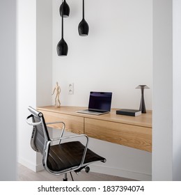 Simple Wooden Desk With Drawers In Home Office Room With Comfortable Chair And Ceiling Lighting