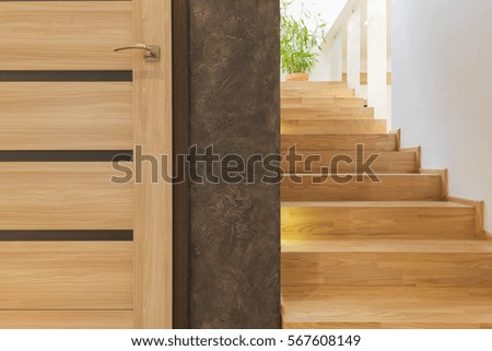 Similar – Image, Stock Photo a wooden staircase with railing leads from the sandy beach to a dune with dune grass and flagpole