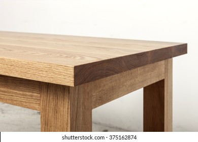 A Simple(minimal) Oak Wood Office Desk(dining Table) On The Vintage White Bottom, White Wall.