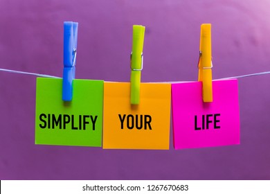 Simplify Your Life Text On Colorful Note Papers