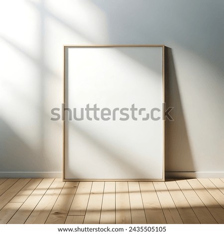 A simplistic and clean interior design featuring a blank portrait-oriented canvas with a thin light wood frame