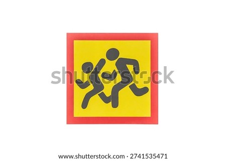 Simplistic illustration of two running figures on a yellow sign with red border, depicted against a transparent background
