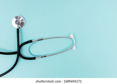 Simply Minimal Composition With Stethoscope Or Phonendoscope Isolated On Light Blue Background. Instrument Device For Doctor. Health Care Life Insurance Concept