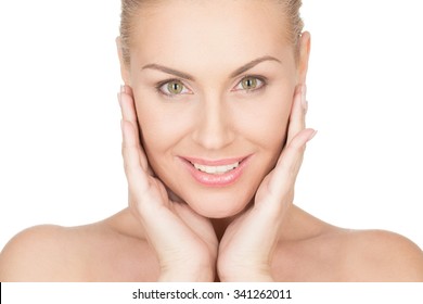 Simply Perfect. Horizontal Portrait Of A Beautiful Mature Woman Cupping Her Face In Her Hands And Smiling Confidently 