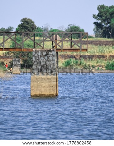 A simply supported bridge constructed on the river
