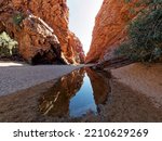  Simpson Gap with cliff reflections in water,  Alice Springs,  West Macdonnell Rages,  Central Australia. Burt Plain,  Northern Territory.