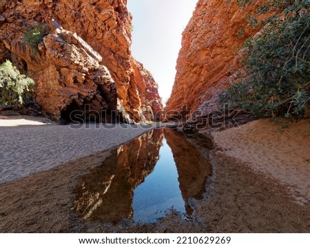  Simpson Gap with cliff reflections in water,  Alice Springs,  West Macdonnell Rages,  Central Australia. Burt Plain,  Northern Territory.
