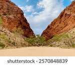 Simpsons Gap with towering red cliffs in the West MacDonnell Ranges