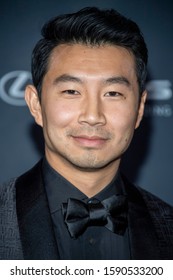 Simu Liu Attends 18th Annual Unforgettable Gala At The Beverly Hilton, Beverly Hills, CA On December 14, 2019