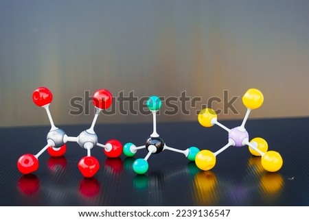 Simulate Shape of covalent molecules on black background. Soft and selective focus.                               