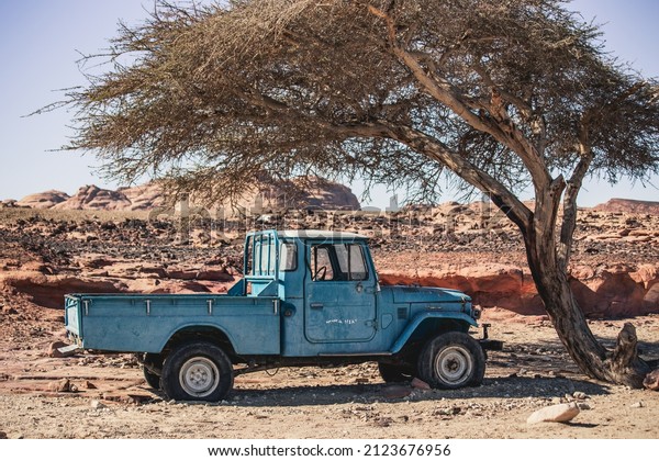 Sinai, Egypt - February 2022: Old\
vintage abandoned Toyota truck in the desert of Sinai,\
Egypt