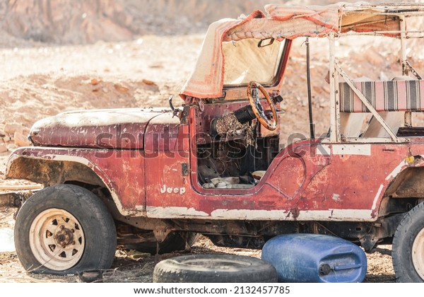 Sinai, Egypt - February 2022: Old\
vintage abandoned Toyota truck in the desert of Sinai,\
Egypt