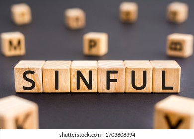 Sinful - word from wooden blocks with letters, wicked and immoral sinful concept, random letters around white background