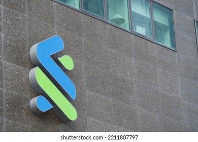 Singapore 1 June 2022. Standard Chartered Bank Logo On Financial Building