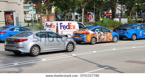 SINGAPORE - 1 MAR 2021. Premier Taxis operates\
Silver Cabs. It has around 9% of the market share. It faces stiff\
competition from the blue Comfortdelgro taxis which command  62% of\
the market share.