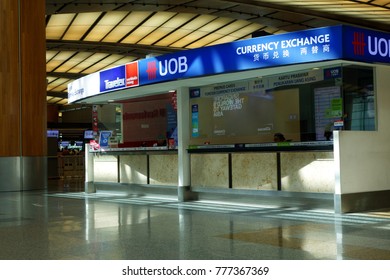 SINGAPORE- 10 DEC, 2017: Currency Exchanging Kiosk In Singapore Changi Airport. Currency Exchange Kiosks Can Be Found Is All Terminals In The Airport.