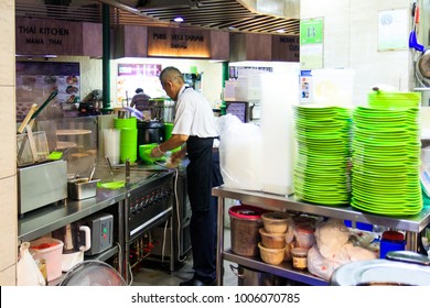 Singapore, 11 August 2017 - Man Preparing Food At A Hawker Centre