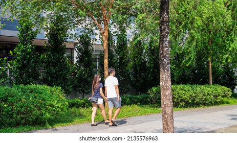 SINGAPORE - 14 MAR 2022: A young couple goes out for breakfast and brisk walks around Watertown mall. Brisks walks along the Punggol Promenade  promote physical and mental health of young couples. 