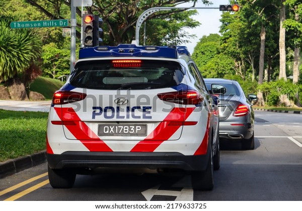 SINGAPORE - 16 JUL 2022: A Singapore Police Car
with the latest high tech policing computers patrols the Thomson
Hills Estate daily.