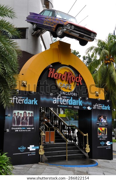 SINGAPORE - 19 OCTOBER 2012: Hard Rock Cafe located\
at Orchard Road is one of most visited restaurants by tourists in\
Singapore. HRC is an American chain of theme restaurant founded in\
1971.