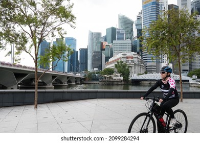 Singapore - 1st January 2021: A Cyclist Is Cycling In The City.