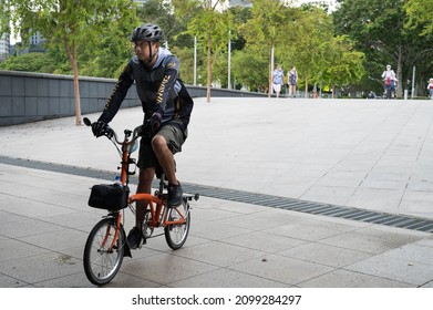 Singapore - 1st January 2021: A Cyclist Is Cycling In The City.