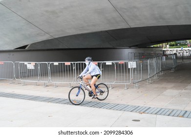 Singapore - 1st January 2021: A Cyclist Is Cycling In The City.