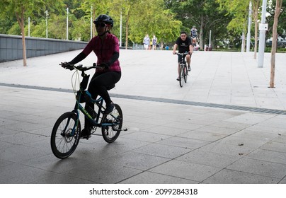 Singapore - 1st January 2021: A Cyclist Is Cycling In The City.