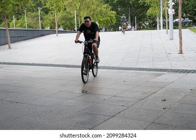 Singapore - 1st January 2021: A Cyclist Is Cycling In The City.