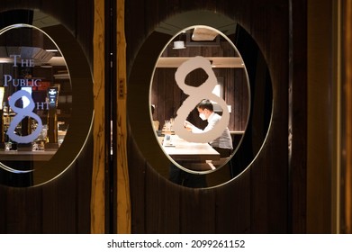 Singapore - 1st January 2021: A Man Is Sitting In A Restaurant.