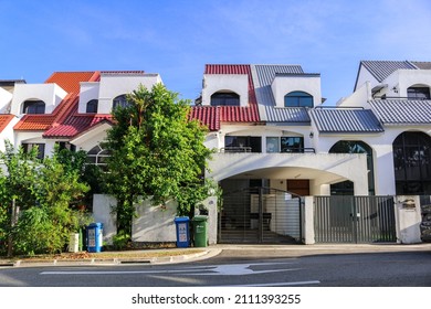 SINGAPORE - 22 JAN 2022: Florrisa Park's 3-storey terrace houses with arched windows and air wells are over 40 years old, but they have spacious bedrooms compared to newer houses. 
