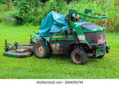 SINGAPORE - 24 OCT 2021:  This Type Of Grass Cutting Machine Is Used By Migrant Workers To Mow The Public Lawn Areas Of Housing Estates And Open Forest Paths. Town Councils Tender The Work For Bids.