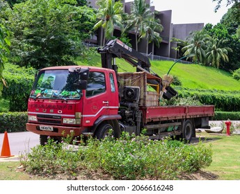 SINGAPORE - 28 JUL 2021: This Big  Truck Is Used For Roadside Tree Trimming And Cutting In Sentosa Island.