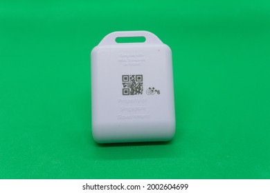 Singapore, 5 July 2021 - A Physical Device That Exchanges Bluetooth Signals Called TraceTogether Tokens. Use As An Aid Digital Contact Tracing Efforts Of Covid-19 In Singapore