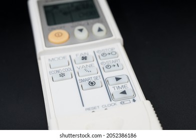 Singapore - 5th October 2021: A White Color Aircon Remote Control From Mitsubishi Electric.