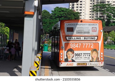 SINGAPORE -8 JAN 2022: The Wrap Advert On This Public Bus Is An Example Of Transit Advertising Which Is Advertising Placed In Or On Modes Of Public Transportation Or In Public Transportation Areas.