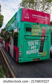 SINGAPORE - 8 JUL 2022: Attractive Vehicle Wrap Advertisements For Ginseng Brand  CHEONG KWAN JANG On The Sides And Back Of A Public Bus Are An Effective Mobile Or Transit Billboard Creating Awareness