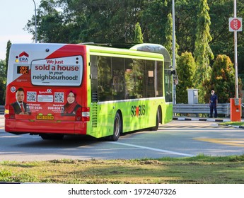 SINGAPORE -9 MAY 2021: The Wrap Advert On This Public Bus Is An Example Of Transit Advertising Which Is Advertising Placed In Or On Modes Of Public Transportation Or In Public Transportation Areas.