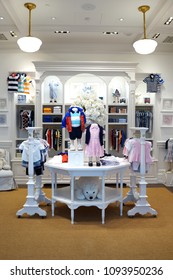 SINGAPORE - APR 22, 2018: Interior view of Ralph Lauren Store in Marina Bay Sands Shopping mall, Singapore. Best known for the Polo Ralph Lauren clothing brand.