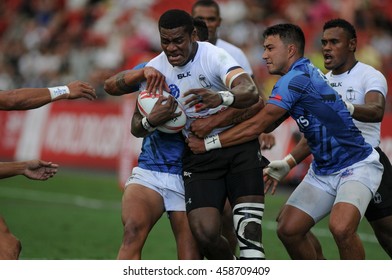 SINGAPORE - APRIL 16,2016 : Fiji 7s Rugby Team (white) Plays Against Samoa At HSBC World Rugby Sevens Series Singapore.