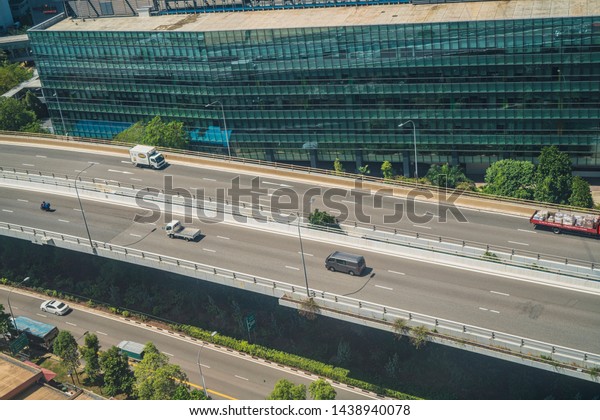 Singapore, April, 2019.\
View of the highway seen from Singapore Cable Car. Opened on 15\
February 1974, it was the first aerial ropeway system in the world\
to span a harbour.