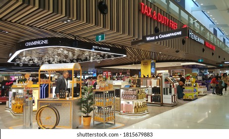 Singapore - Aug 2020: Shopfront view of Heinemann Tax & Duty Free at Changi International Airport. Global travel retailer, selling tobacco, fine foods & sweet, make up, skin care, fragrance, wine.