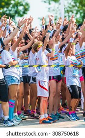 Singapore - Aug 22: Crowds of unidentified people at The Color Run on Aug 22, 2015 in Singapore. 