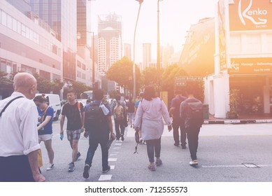 Singapore - Aug 25 2017: People Crossing Street In Orchard Rd, Singapore